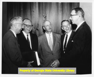 Stanton Smith, David Dubinsky, George Meany, Paul Christopher, and Estes Kefauver, at a labor event, circa 1950s.