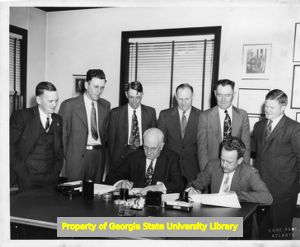 IBEW members at a document signing