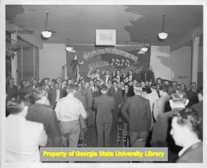 Men taking pledge at CIO event, early 1950s.