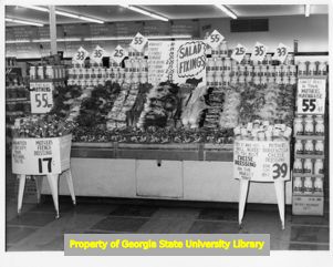 Produce display at a Colonial grocery store