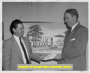 J. W. Giles presenting documents, Atlanta, Georgia.