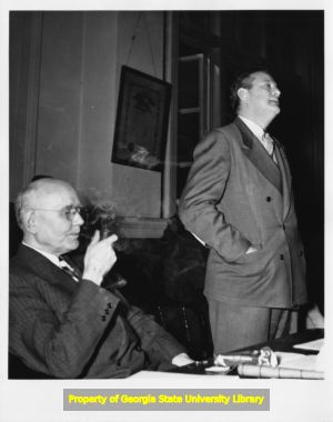 Man speaking at a meeting of labor leaders, 1930s