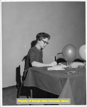 Woman recording minutes at Mississippi AFL-CIO convention, Vicksburg, Mississippi, 1960.