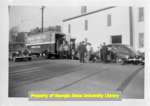 UFWA strikers boarding furniture company trucks, Memphis, Tennessee.