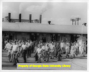 Workers leaving a plant