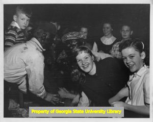 Children, some in black face
