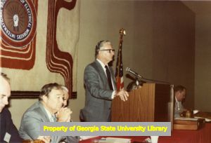 Claude Ramsay speaks at IBEW meeting, September 1983.