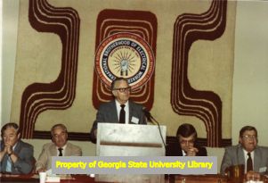 Claude Ramsay speaking at IBEW meeting, 1983.