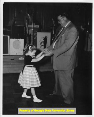 Man and girl dancing at Mississippi Labor Council convention, Jackson, Mississippi, April 1958.
