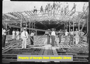 Construction workers building a tabacco warehouse in Greeneville, Tennessee.