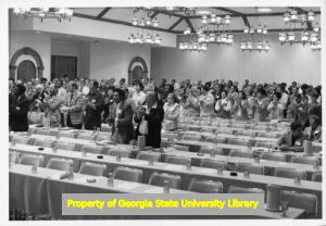 Audience applauding at Mississippi AFL-CIO convention, Jackson, Mississippi, 1976.