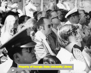 Claude Ramsay in crowd at ship launching, Pascagoula, Mississippi, 1977.