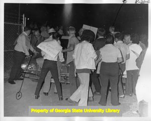 Striking United Textile Workers of America, Local 532 members picketing outside a Leon-Ferenbach textile plant, 1973