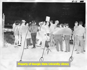 Striking United Textile Workers of America, Local 532 members picketing outside a Leon-Ferenbach textile plant, 1973