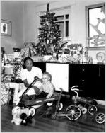 Child with Christmas gifts