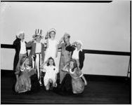 Children dressed in patriotic costumes (Uncle Sam, George Washington, General Douglas McArthur, etc.), saluting. Children are from the E.L. Connally Elementary School, Atlanta, Georgia, 1942