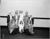 Children dressed in patriotic costumes (Uncle Sam, George Washington, General Douglas McArthur, etc.). Children are from the E.L. Connally Elementary School, Atlanta, Georgia, 1942