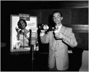 Zenas Sears, WGST Radio personality, promoting "20 Grand Cream Ale," for the Gate City Beverage Company, 350 Marietta Street, Atlanta, Georgia, October 10, 1951.