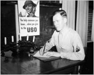 Soldier writing a letter at a USO Service Men's Center, Atlanta, Georgia, 1942.