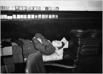 Soldier sleeping at a USO Service Men's Center, Atlanta, Georgia, 1946.