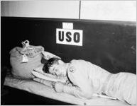 Soldier sleeping at a USO Service Men's Center, Atlanta, Georgia, 1946.