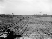Mechanized formation on the move at Fort Benning, 1941