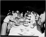 Picnic table, at Davison-Paxon Company's picnic in Chastain Park (formerly, North Fulton Park), Atlanta, Georgia, July 1, 1954.