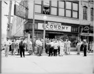 WBGE reporter and crowd outside General Auto Stores building, Whitehall and Mitchell Streets, Atlanta, Georgia, May 19, 1948. Photo commissioned by Eastern Air Lines.