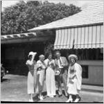 People standing in front of the Hind-Clarke Dairy Ice Cream Stand, Aina Haina Valley, Honolulu, Hawaii, 1930s