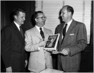 MGM group with promotional material