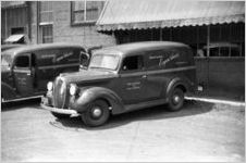 Vehicles for Eugene Harris, a cleaning company located in Midtown, Atlanta, Georgia, 1930s