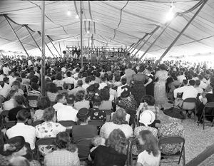 Crowds gathered under the Jessup Brothers Revival tent service, 1950