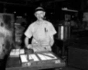 Portrat of print shop employee working on the Journal of Labor, 1954