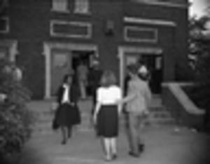 African Americans entering and leaving courthouse during voting, 1946