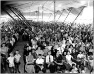 Crowds gathered under the Jessup Brothers Revival tent service, 1950