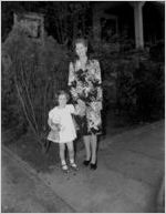 Evie Robert, with her step-granddaughter in the Robert family garden, Atlanta, Georgia, April 25, 1943