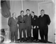 Tyrone Power, in Marine Corps. uniform, with four members of the Atlanta, Georgia Lions Club, December 8, 1944, 2