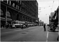 Street scene along Peachtree Street at the intersection with Ellis Street. Davison-Paxon Department Store on the left. Commissioned by Lowe & Stevens Advertising Agency, Atlanta, Georgia, January 9, 1952