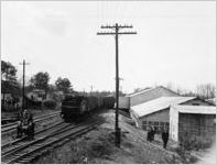 Railroad workers laying railroad tracks