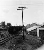 Railroad workers laying railroad tracks