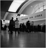 Two strikers (picketers). Eastern Air Lines Flight Engineers, at Hartsfield International Airport, October 6, 1964