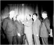 Metro-Goldwyn Mayer, men receiving 6th War bonds buttons