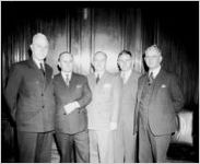 Metro-Goldwyn-Mayer, men receiving 6th War bonds buttons