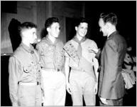 U.S.O. event (officer with Boy Scouts)