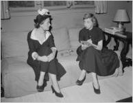 Anita Colby (left) being interviewed by another woman,Atlanta, Georgia, May 11, 1948