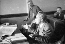 L.W. "Chip" Robert, secretary of the Democratic National Committee,  at a hearing before the "economy" committee of the Georgia General Assembly in a dispute over his business practices, Atlanta, Georgia, February 1939