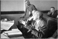 L.W. "Chip" Robert, secretary of the Democratic National Committee,  at a hearing before the "economy" committee of the Georgia General Assembly in a dispute over his business practices, Atlanta, Georgia, February 1939