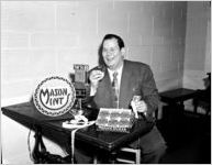 WSB radio personality with Mason Mints display