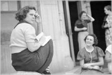Agnes Scott College student sitting on stairway in front of Buttrick Hall, Decatur, Georgia, September 1937