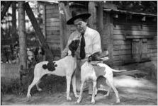 South Carolina Senator Ellison DuRant Smith, "Cotton Ed" Smith with hunting dogs, South Carolina, 1938.